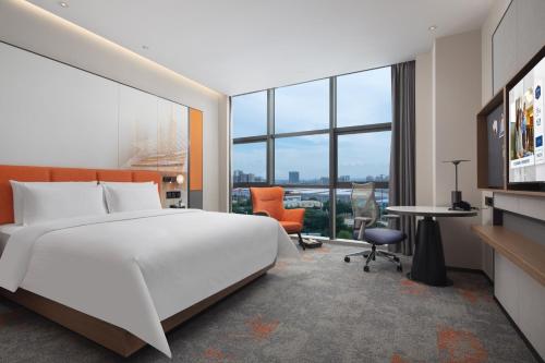 Imagen de la habitación del Hotel Hilton by Hampton Guangzhou Xintang. Foto 15