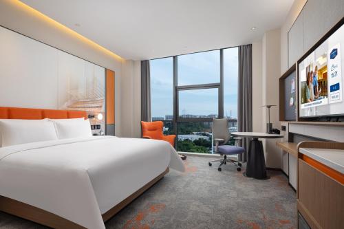 Imagen de la habitación del Hotel Hilton by Hampton Guangzhou Xintang. Foto 18