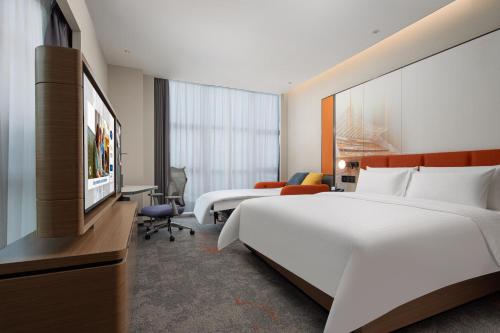 Imagen de la habitación del Hotel Hilton by Hampton Guangzhou Xintang. Foto 20