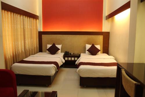 Imagen de la habitación del Hotel Hiltown. Foto 11