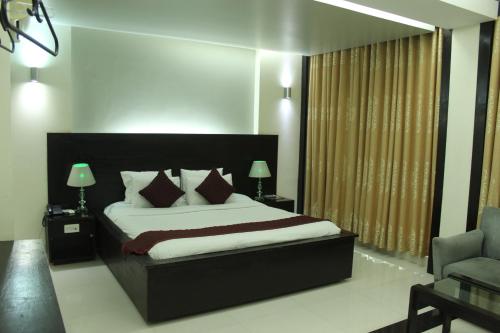 Imagen de la habitación del Hotel Hiltown. Foto 12