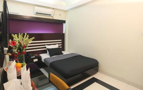 Imagen de la habitación del Hotel Hiltown. Foto 14