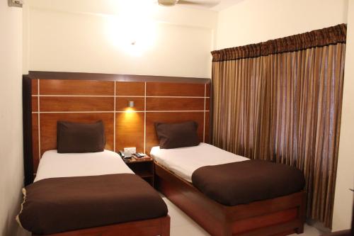 Imagen de la habitación del Hotel Hiltown. Foto 18