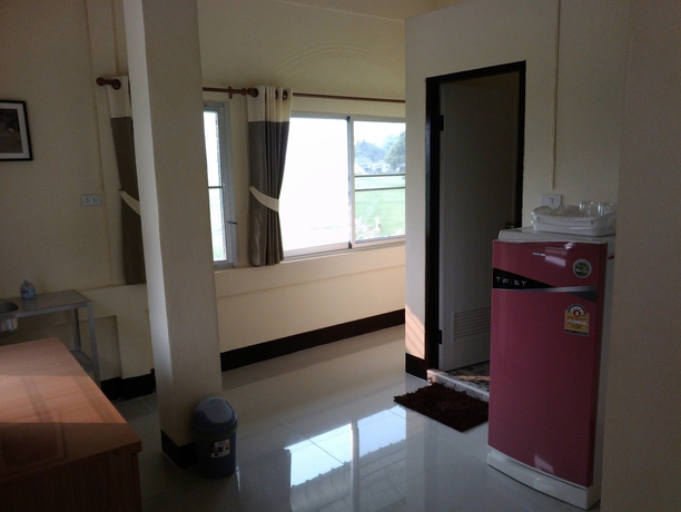 Imagen de la habitación del Hotel Him Doi House. Foto 3