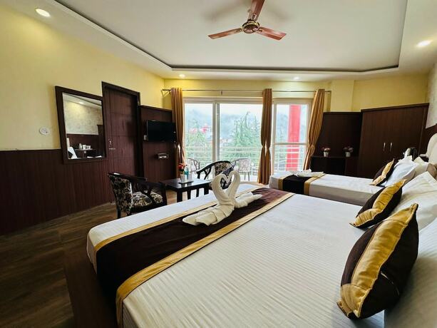 Imagen de la habitación del Hotel Him Holiday Ventures. Foto 15