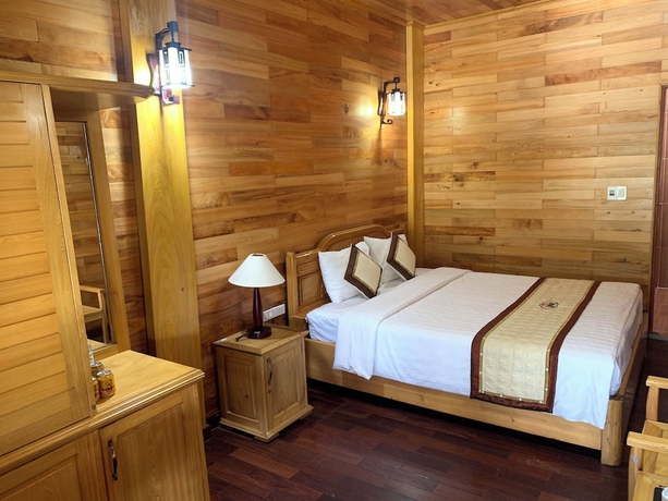 Imagen de la habitación del Hotel Him Lam Eco Resort. Foto 4