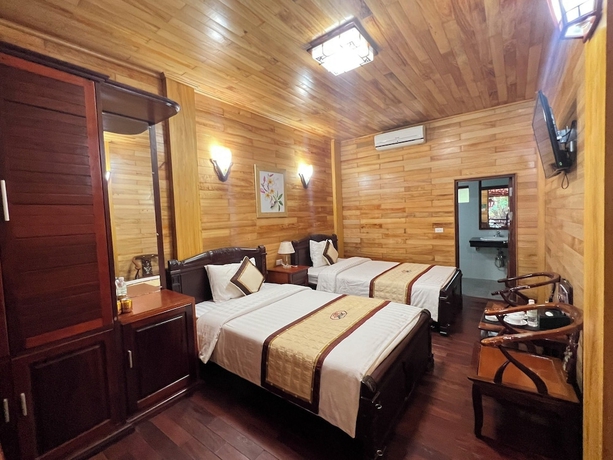 Imagen de la habitación del Hotel Him Lam Eco Resort. Foto 7
