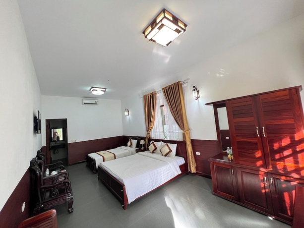 Imagen de la habitación del Hotel Him Lam Eco Resort. Foto 8