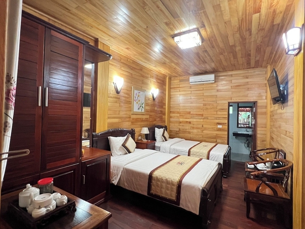 Imagen de la habitación del Hotel Him Lam Eco Resort. Foto 9