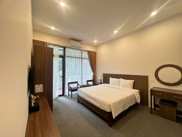 Imagen de la habitación del Hotel Him Lam Eco Resort. Foto 14