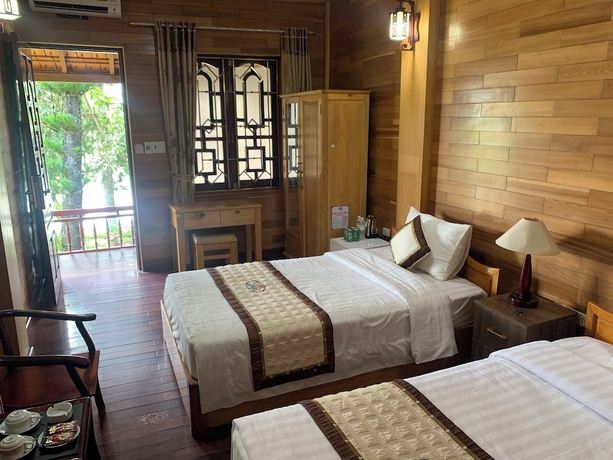 Imagen de la habitación del Hotel Him Lam Eco Resort. Foto 15