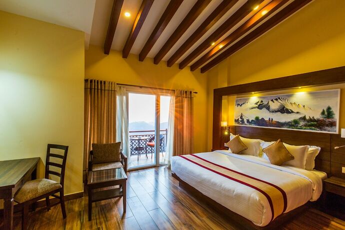 Imagen de la habitación del Hotel Himalaya Drishya Resort. Foto 20