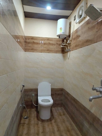 Imagen de la habitación del Hotel Himalaya Inn Guest House. Foto 11