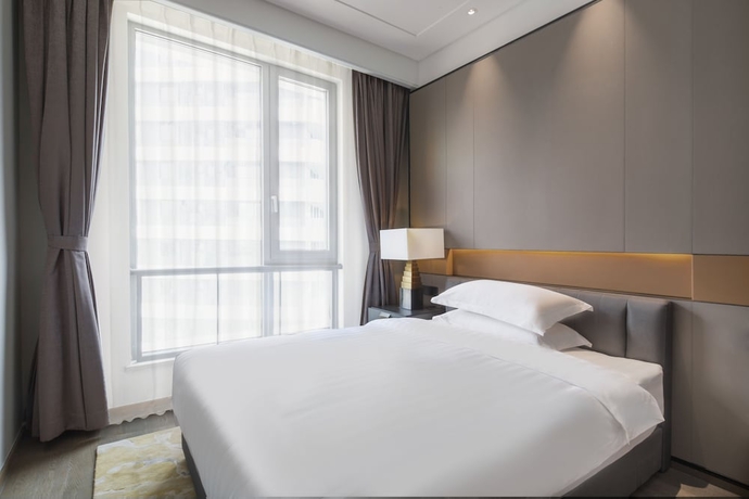 Imagen de la habitación del Hotel Himalaya Serviced Residences Chongqing. Foto 10