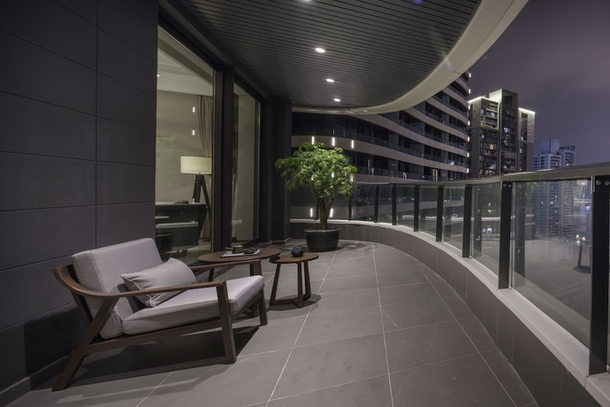 Imagen de la habitación del Hotel Himalaya Serviced Residences Chongqing. Foto 12