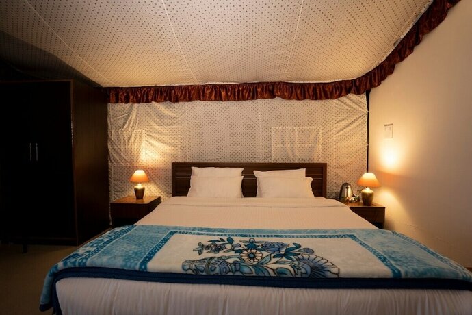 Imagen de la habitación del Hotel Himalayan Camps And Resort. Foto 18