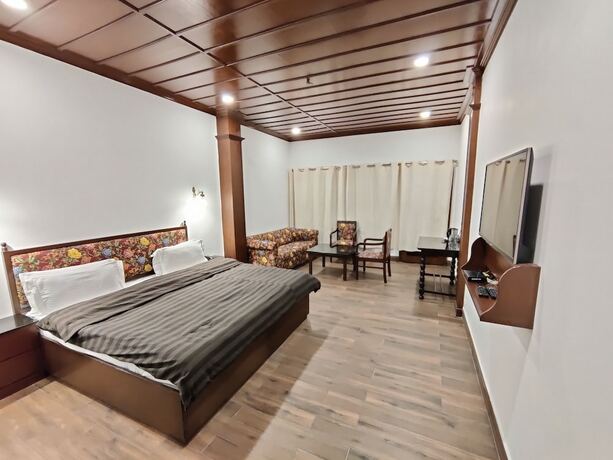 Imagen de la habitación del Hotel Himalayan Club. Foto 14