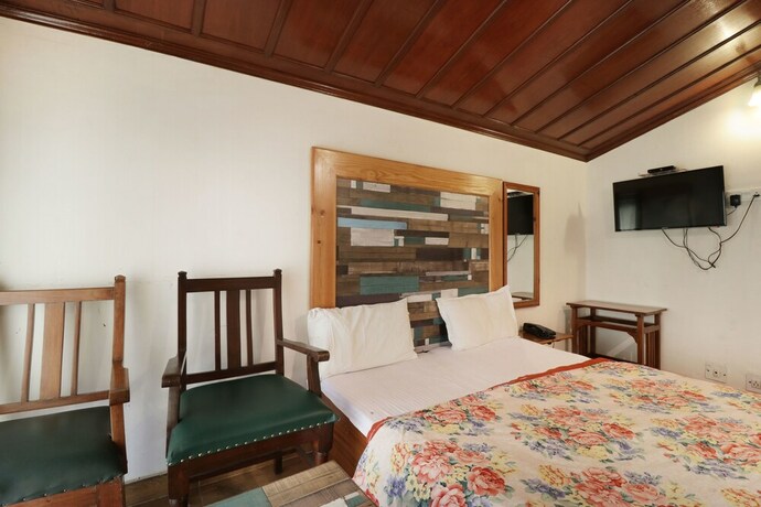Imagen de la habitación del Hotel Himalayan Club. Foto 15