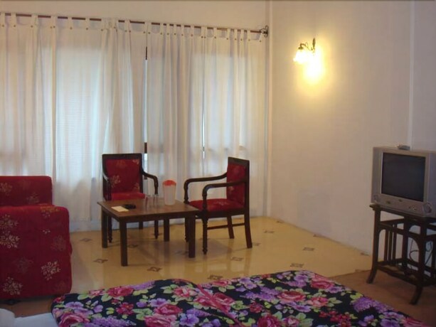 Imagen de la habitación del Hotel Himalayan Club. Foto 18