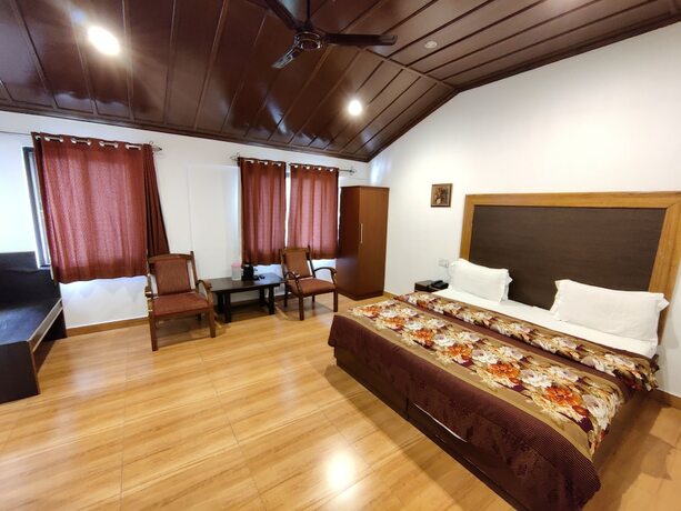 Imagen de la habitación del Hotel Himalayan Club. Foto 20