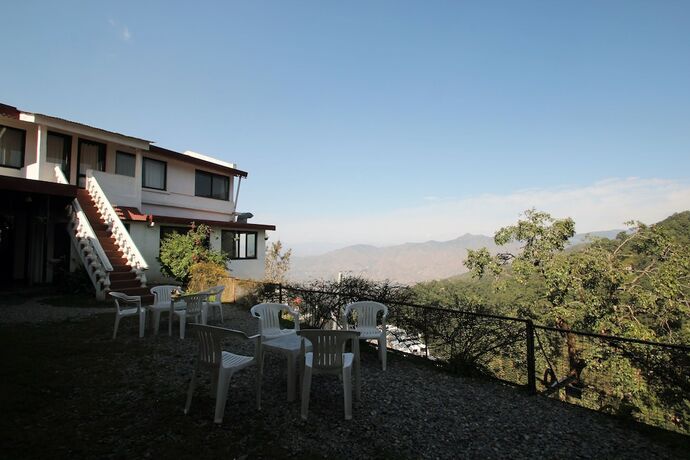Imagen de la habitación del Hotel Himalayan Club. Foto 22