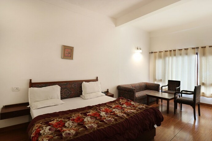Imagen de la habitación del Hotel Himalayan Club. Foto 24