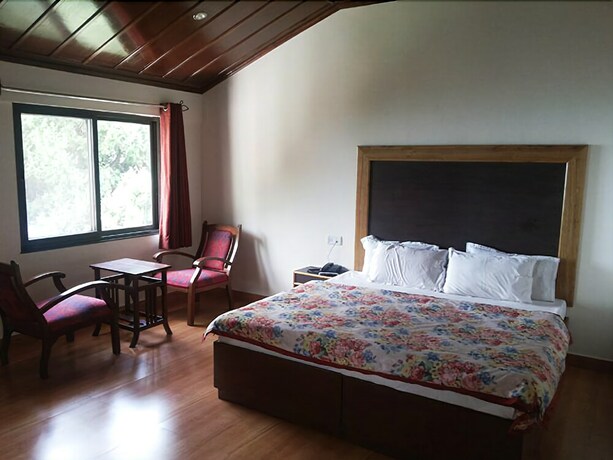 Imagen de la habitación del Hotel Himalayan Club. Foto 26