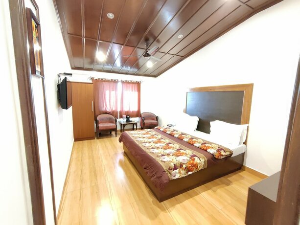 Imagen de la habitación del Hotel Himalayan Club. Foto 28