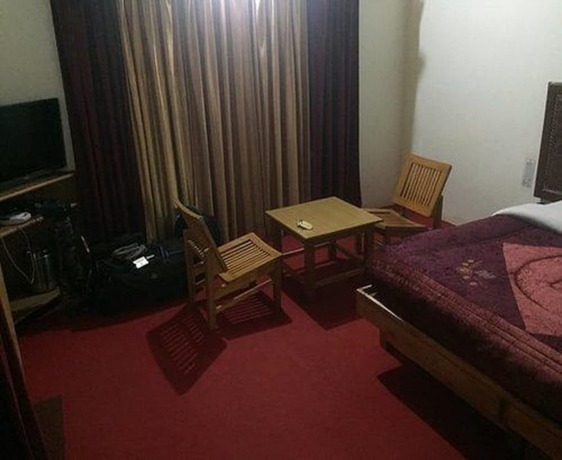 Imagen de la habitación del Hotel Himalayan Eco Resort. Foto 13