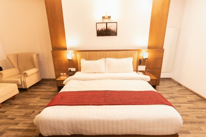 Imagen de la habitación del Hotel Himalayan Splendour Resort. Foto 13