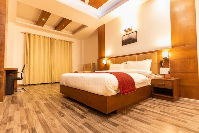 Imagen de la habitación del Hotel Himalayan Splendour Resort. Foto 17