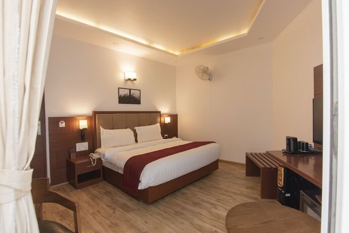 Imagen de la habitación del Hotel Himalayan Splendour Resort. Foto 18