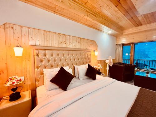 Imagen de la habitación del Hotel Himalayan Village Resort, Manali. Foto 18