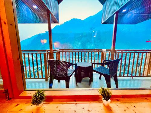 Imagen de la habitación del Hotel Himalayan Village Resort, Manali. Foto 19