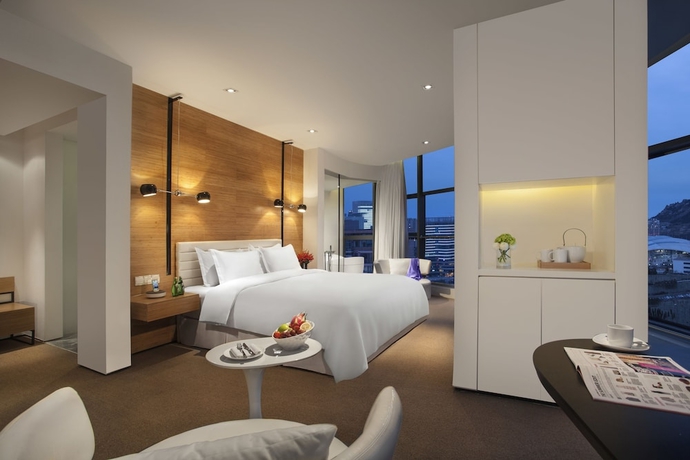 Imagen de la habitación del Hotel Himalayas Qingdao. Foto 8