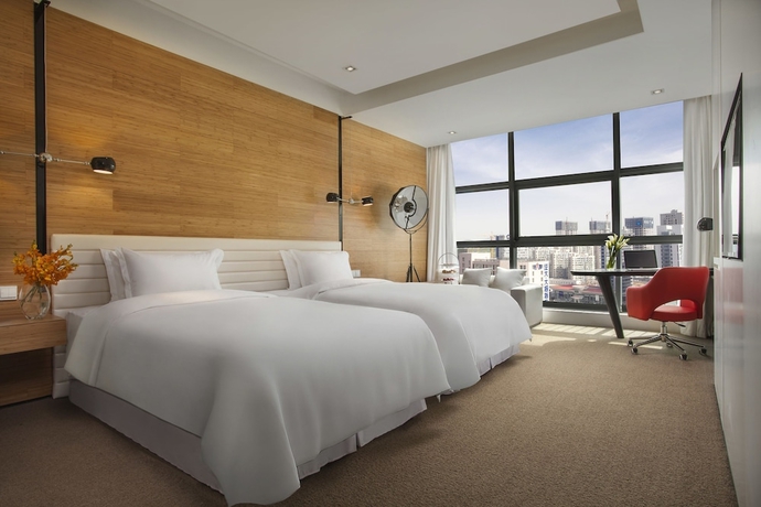 Imagen de la habitación del Hotel Himalayas Qingdao. Foto 12