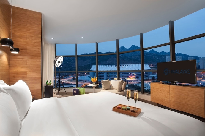 Imagen de la habitación del Hotel Himalayas Qingdao. Foto 14