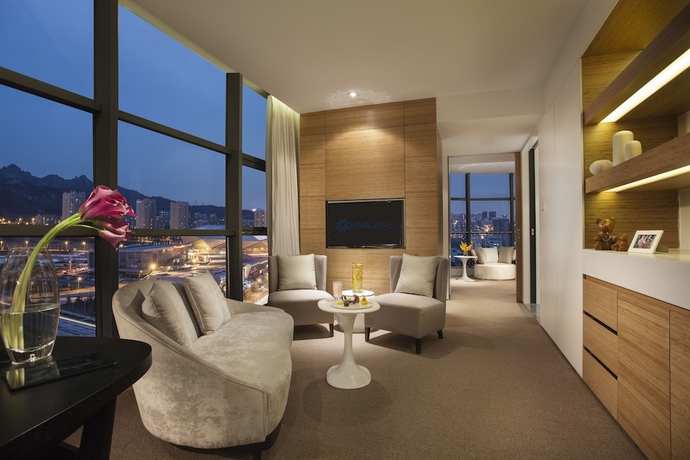 Imagen de la habitación del Hotel Himalayas Qingdao. Foto 15