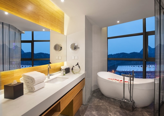 Imagen de la habitación del Hotel Himalayas Qingdao. Foto 16