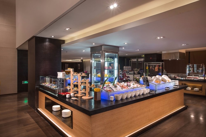 Imagen del bar/restaurante del Hotel Himalayas Qingdao. Foto 6