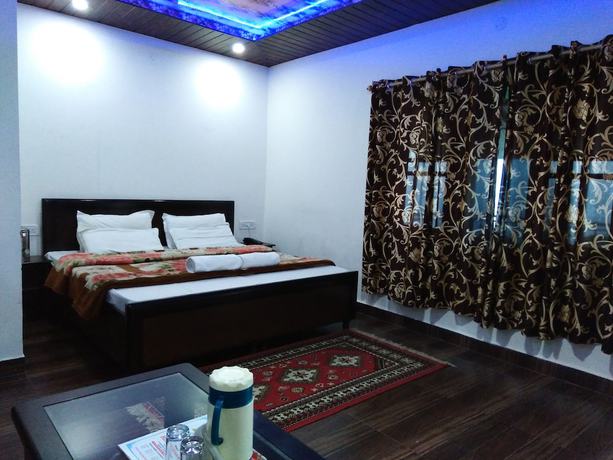 Imagen de la habitación del Hotel Himdhara. Foto 14