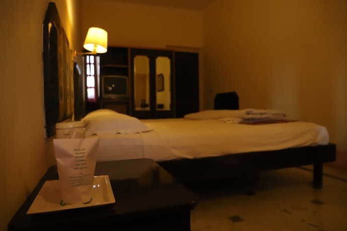 Imagen de la habitación del Hotel Himmatgarh Palace. Foto 10