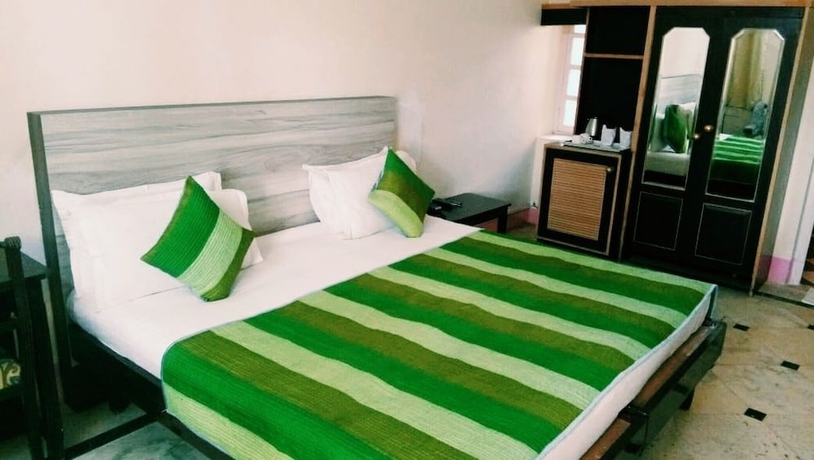 Imagen de la habitación del Hotel Himmatgarh Palace. Foto 12