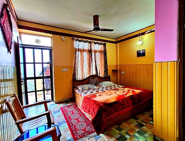 Imagen de la habitación del Hotel Himvadi Resorts kausani. Foto 7