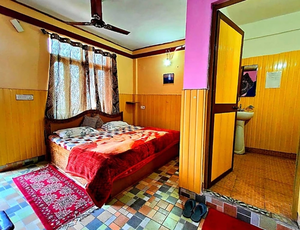 Imagen de la habitación del Hotel Himvadi Resorts kausani. Foto 12