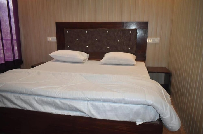 Imagen de la habitación del Hotel Himvant residency. Foto 6