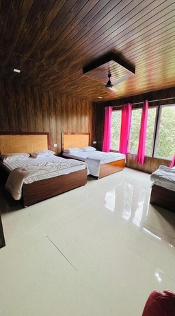 Imagen de la habitación del Hotel Himvant residency. Foto 7