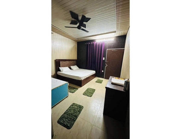 Imagen de la habitación del Hotel Himvant residency. Foto 8
