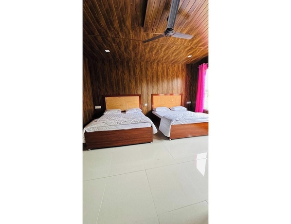 Imagen de la habitación del Hotel Himvant residency. Foto 14