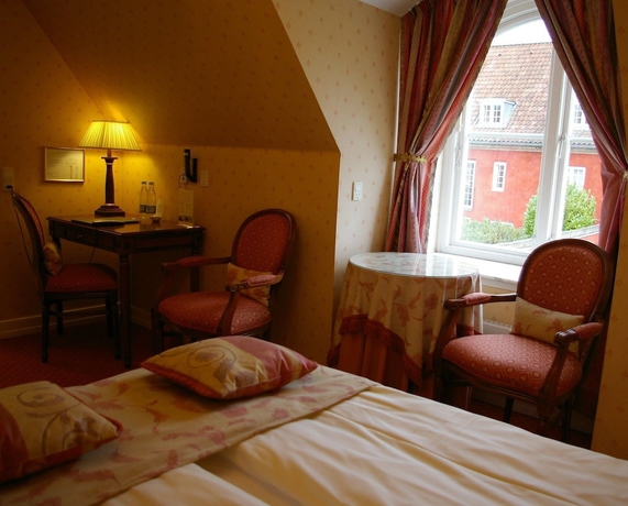 Imagen de la habitación del Hotel Hindsgavl Slot. Foto 8